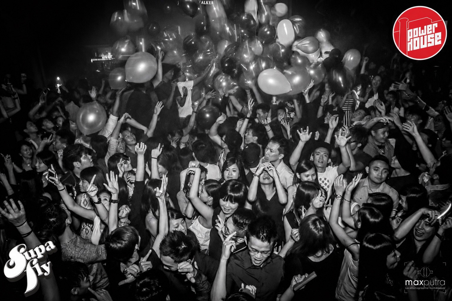 Black and white dance floor scene with balloons